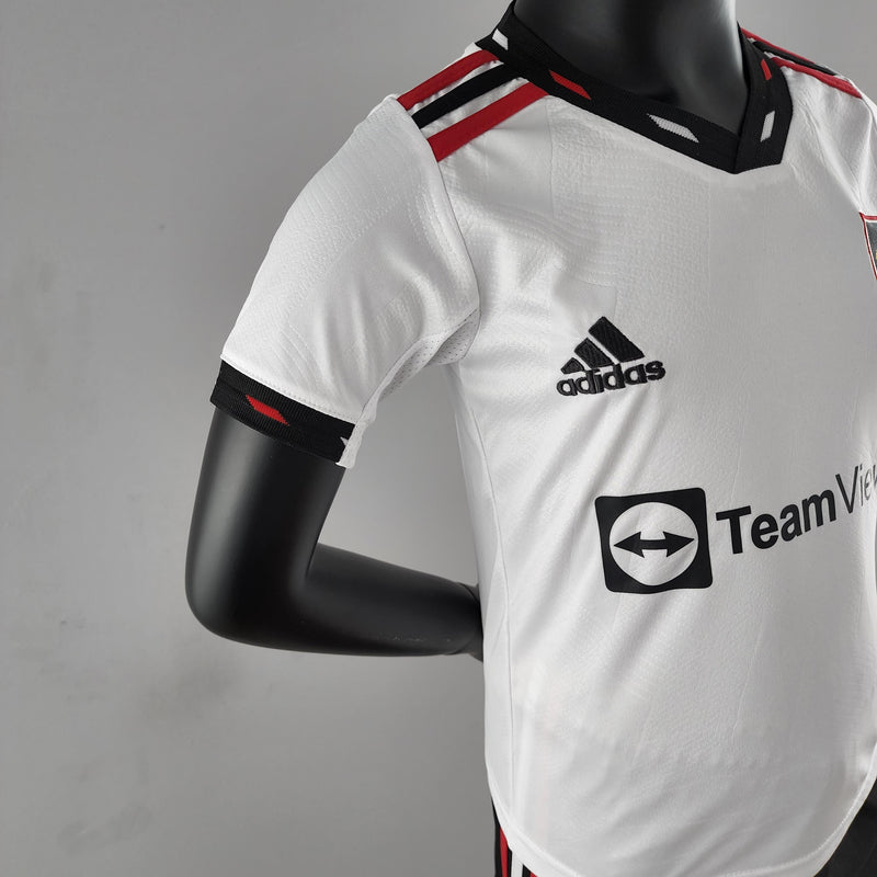 Conjunto Kids Puma Manchester United I 2023